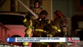 Firefighters work in cold to put out church fire
