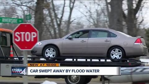 'She could have ended up in the river': Driver swept off flooded roadway in Kenosha County