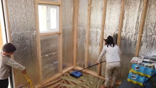 Husband, Wife & Kids help! Family all help in adding shelving and insulation in our off-grid cabin.