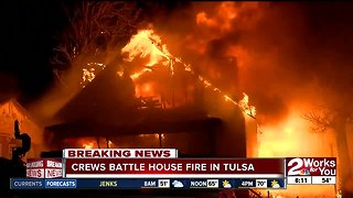 Crews battle house fire in north Tulsa