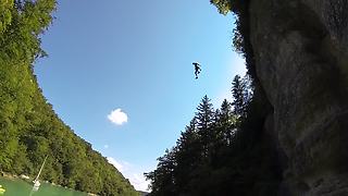 Brave Daredevil Jumps Off 100 Foot Cliff Into The Water