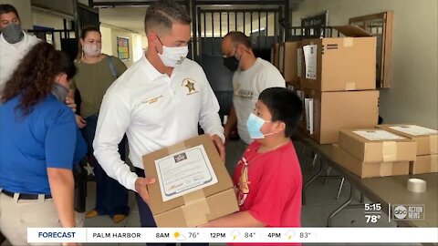 Hillsborough sheriff hands out free computers to help Dover Elementary students with e-learning