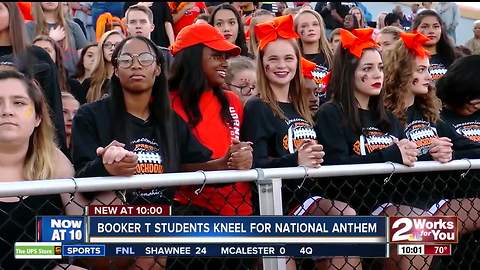 Booker T. Washington High School students join nationwide protest, kneel for national anthem