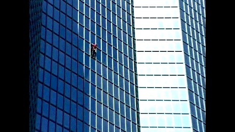 French Spiderman Climbs Totalfina Skyscraper