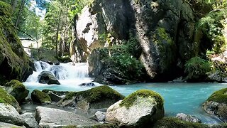 Captivating Waterflow in the Majestic Mountains: A Visual Journey through Nature's Beauty