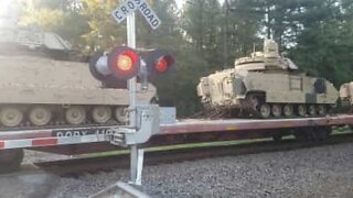 Tanks block driver at level crossing