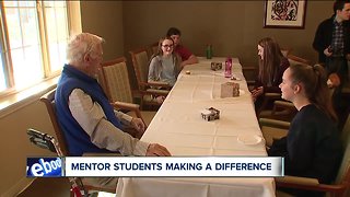 Mentor middle school students listen, learn from their elders during day of service