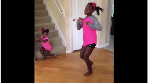 Toddler Steals Sister’s Solo Dance Show Without Noticing