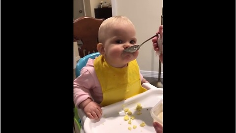 Baby Girl Uses Big Spoon For The Very First Time