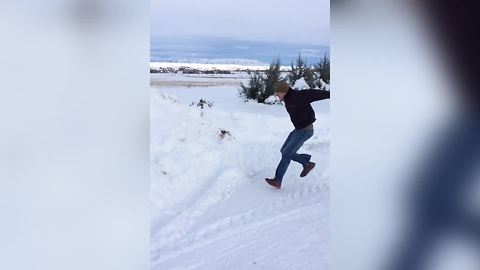 "Snow Diving FAIL: Man Bounces Off Solid Snow"