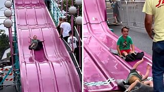 My little brother on the slide. But the kid right before him!