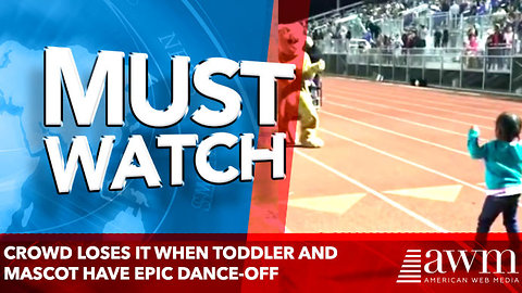 CROWD LOSES IT WHEN TODDLER AND MASCOT HAVE EPIC DANCE-OFF