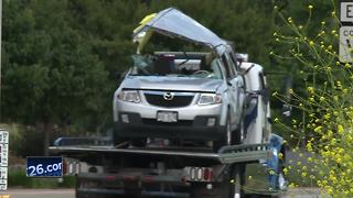 Woman cut out of SUV after being hit by truck