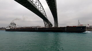 SAM LAUD Ship Under Blue Water Bridges