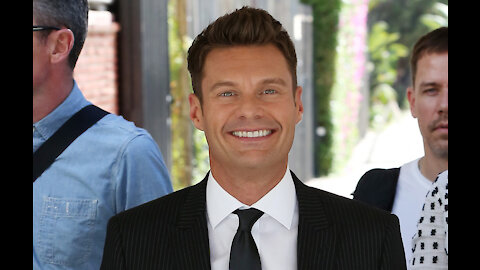 Ryan Seacrest leaves Live from the Red Carpet