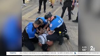 Video show O.C. Police kneeing man