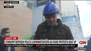 CNN Reporter Gets Hit With Tear Gas In Paris