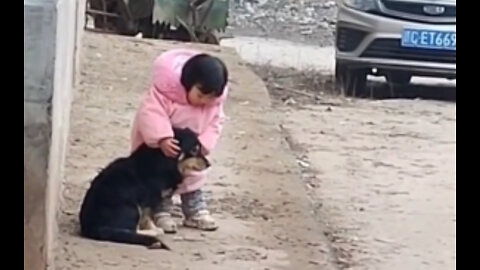 Child who is afraid of her dog being scared by firecrackers