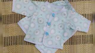 New born baby dress cutting and stitching.