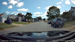 Oblivious Driver Almost hits me coming off curb!