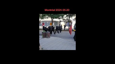 Riot police push back pro-Hamas protestors in Montreal Canada.