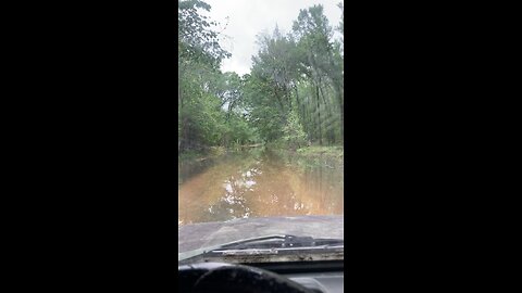 Suzuki Samurai water crossing in the Mississippi Delta