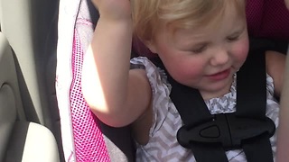 Gorgeous Little Girl Is Enjoying Her Favorite Song While Singing And Dancing