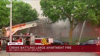 Crews battle large apartment fire in West Allis