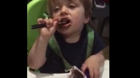 Toddler falls asleep right in the middle of eating his dessert