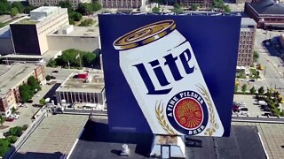 Giant Miller Brewing Company sign installed on top of 22-story building in downtown Milwaukee