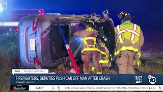 Man trapped under car after pursuit ends in crash