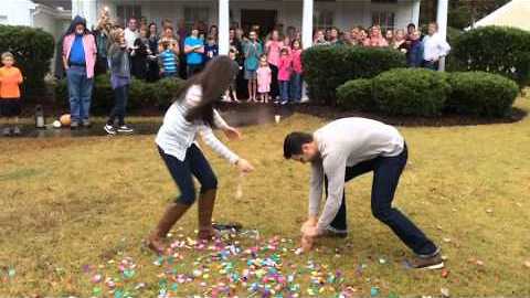 Expecting Couple Was Surprised To See Rainbow Confetti After Popping Gender Reveal Balloon