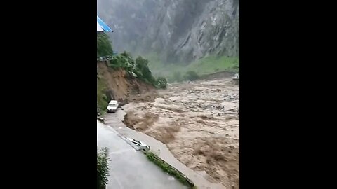 River's Rampage Devouring Roads and Vehicles