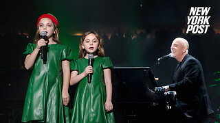 Billy Joel performs with his daughters at Madison Square Garden