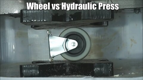 Industrial Wheel Crushed By Hydraulic Press