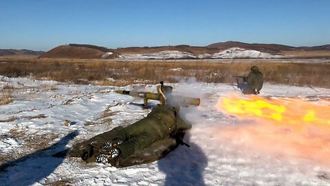 Russian mobilized soldiers fire with anti-tank missile systems and grenade launchers