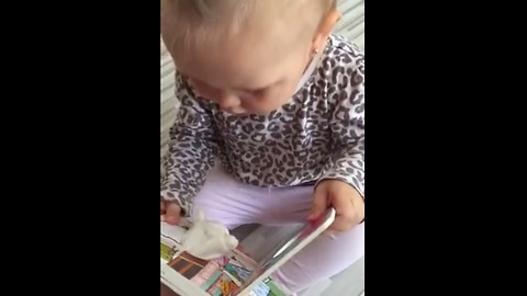 Baby adorably startled by harmless "lamb" book