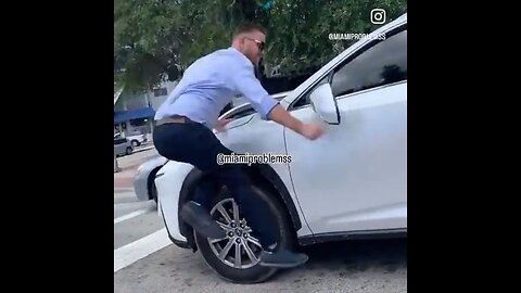 Dude In A Corvette Does A Crazy Karate Chop On Another Car's Mirror During A Road Rage Incident