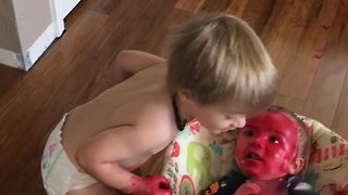 Brother Covers Self And Baby Brother In Red Paint Or Makeup