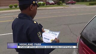 Student officer awards good driving certificates in Highland Park