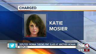 Woman throws pint glass at another woman