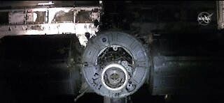 Astronauts dock at International Space Station