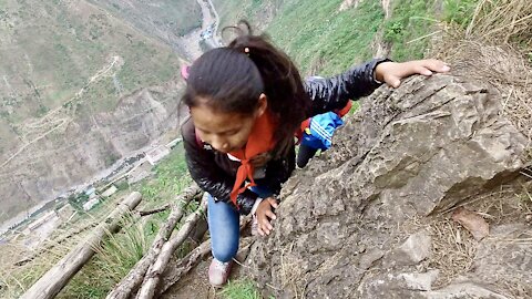 The Most Dangerous Journey to School in the World ...Little Kids Climbing a 2,624 Foot Cliff