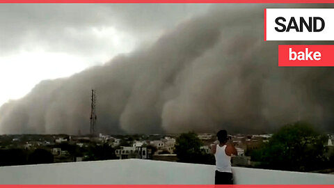 Enormous sand cloud engulfs city during a huge storm