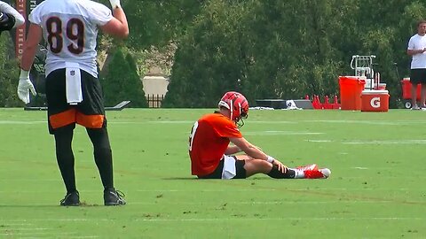 BREAKING: Joe Burrow carted off practice field after going down during a play