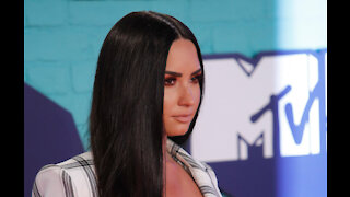 Demi Lovato says fame gave her PTSD