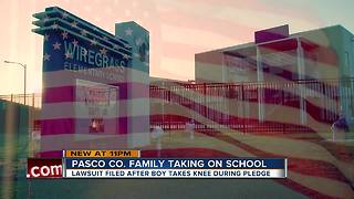 Pasco family sues district after 1st grader told to stand after kneeling during Pledge of Allegiance