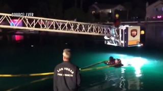 Man, woman rescued after car drives into Desert Shores lake