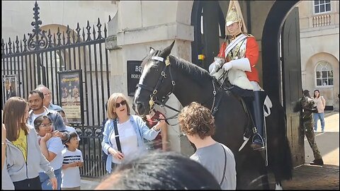 She got away with holding the reins. horse sneezes on her #horseguardsparade