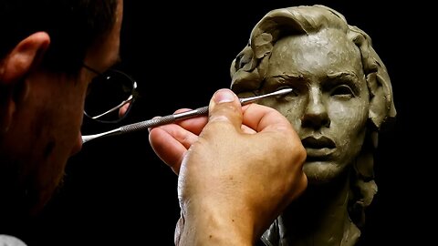 Sculpting A Female Portrait In Clay